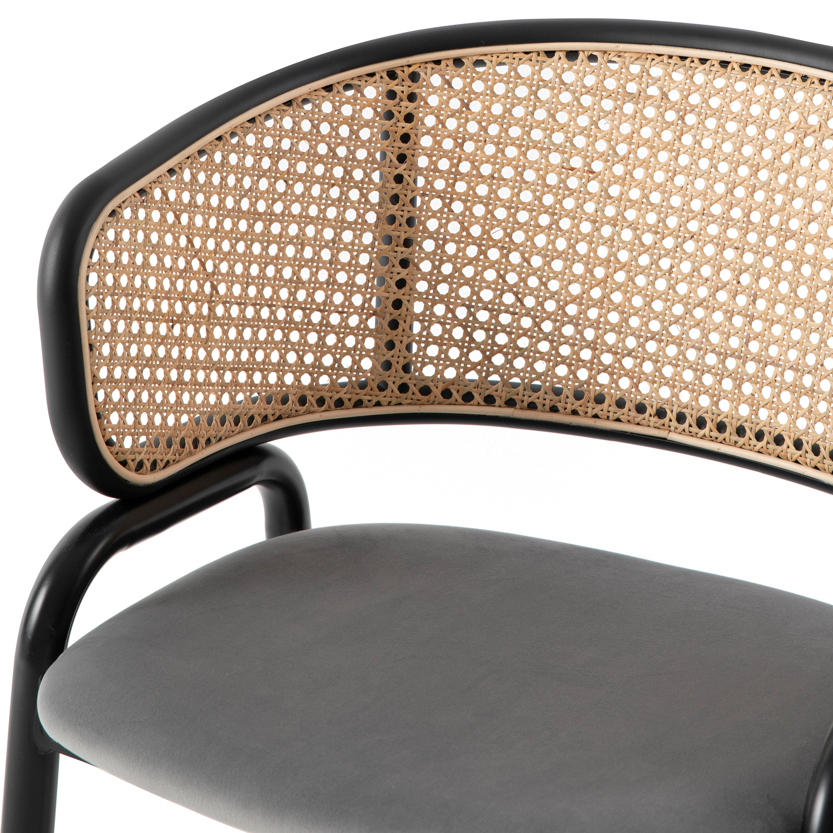 Ervilla Leather Dining Armchair in Black/White Stainless Steel Base With Wicker Back