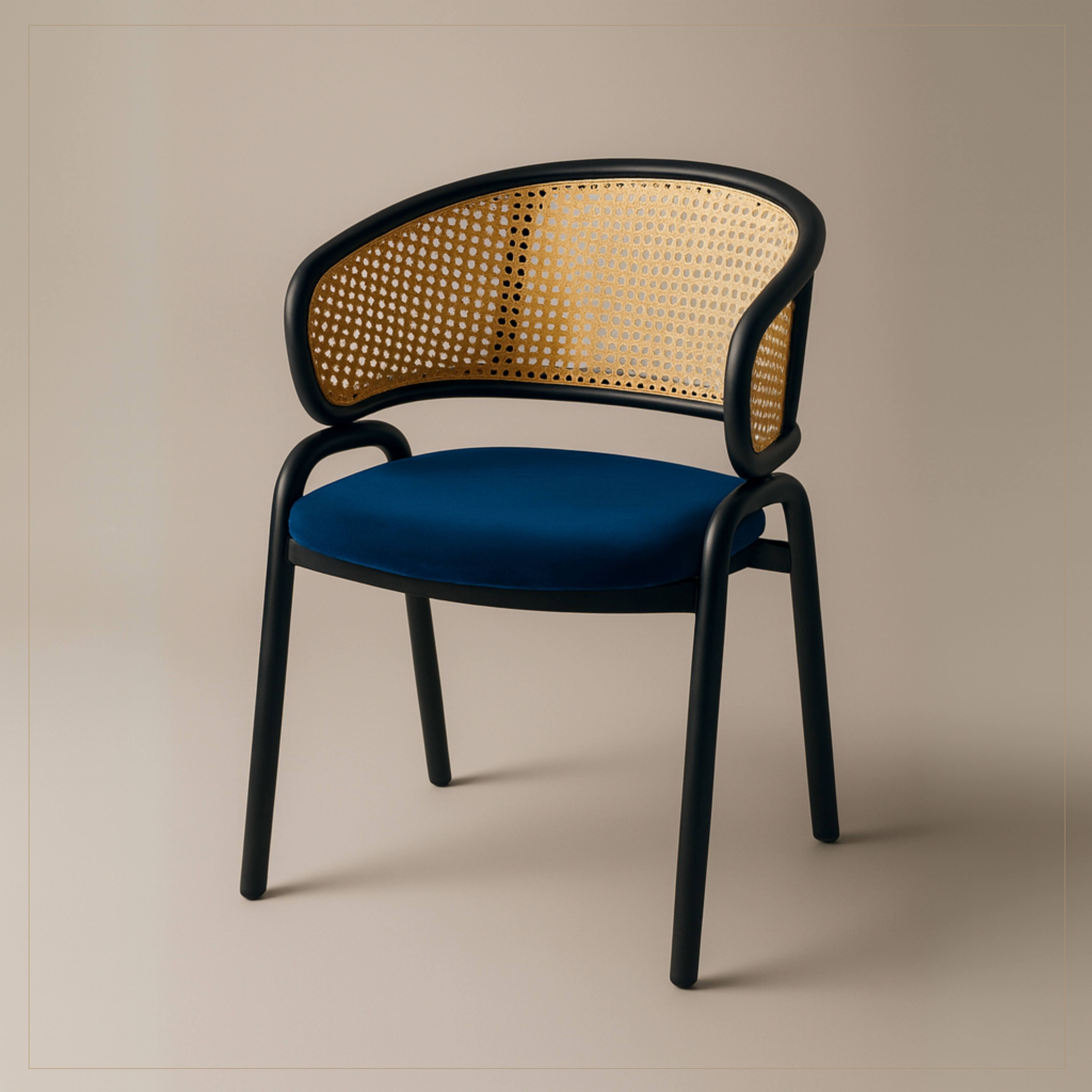 Ervilla Leather Dining Armchair in Black/White Stainless Steel Base With Wicker Back