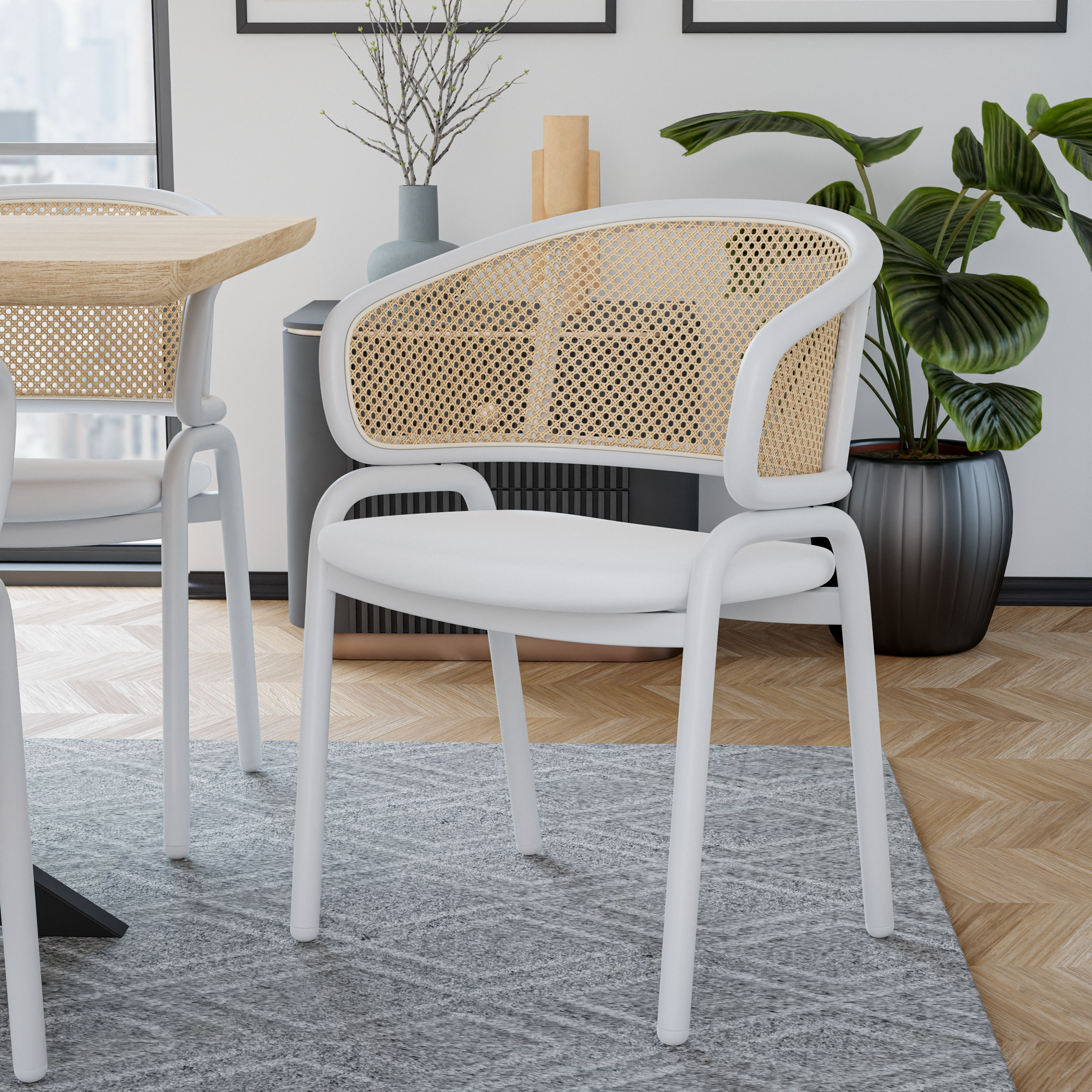 Ervilla Leather Dining Armchair in Black/White Stainless Steel Base With Wicker Back