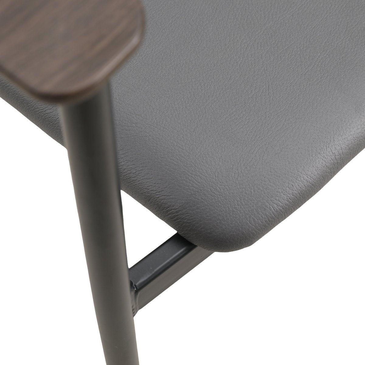 Kora Dining Chair Upholstered in Leather with Stainless Steel Frame and Legs