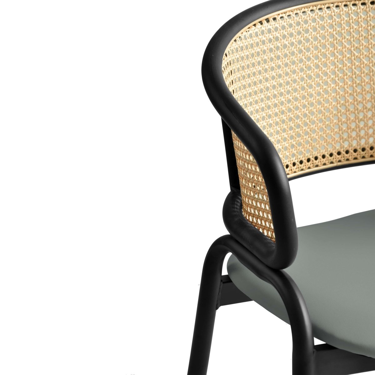 Leisuremod Dining Chair Ervilla Leather Dining Armchair in Black/White Stainless Steel Base With Wicker Back