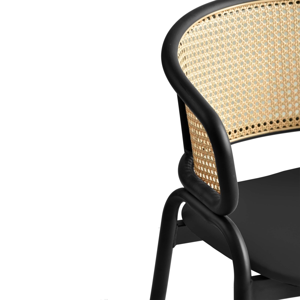 Leisuremod Dining Chair Ervilla Leather Dining Armchair in Black/White Stainless Steel Base With Wicker Back