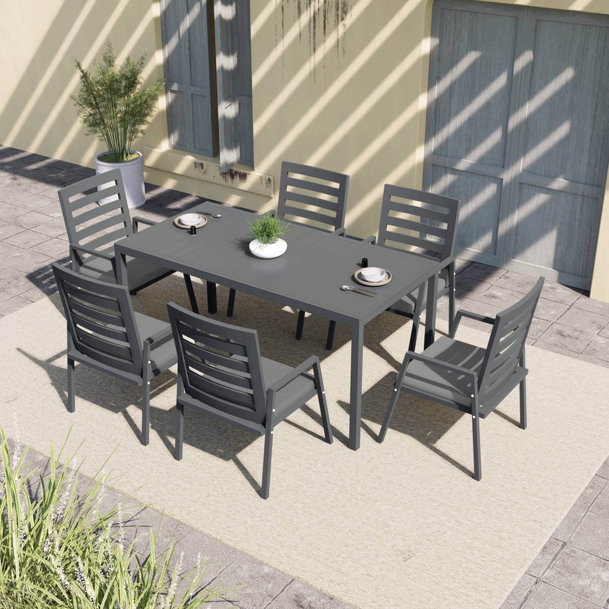 Chelsea 7-Piece Patio Dining Set 78-118" Wide Rectangular Extendable Aluminum Dining Table and 6 Dining Armchair Black Dining Set Leisuremod