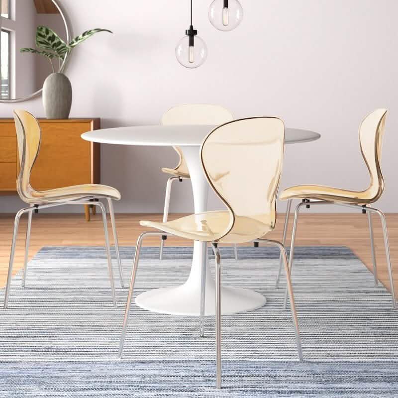 LeisureMod Bristol 5-Piece Dining Set Round White MDF Dining Table and 4 Acrylic Dining Chairs with Chrome Legs Amber Dining Set Leisuremod