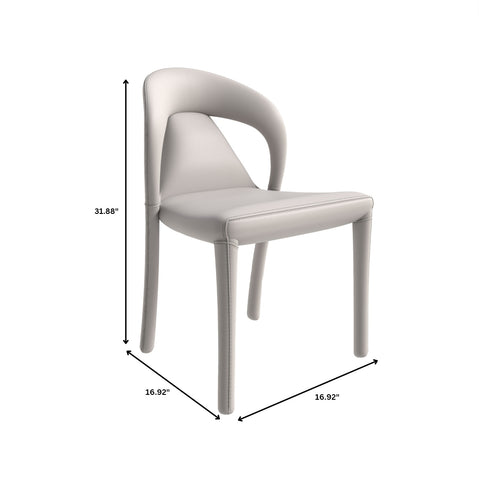 Solace Series Dining Chair Upholstered in Leather with Steel Legs and an Open Back Design