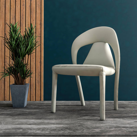 Solace Series Dining Chair Upholstered in Leather with Steel Legs and an Open Back Design